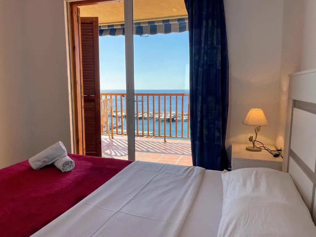 Sunrise Beachfront Apartment by the Marina